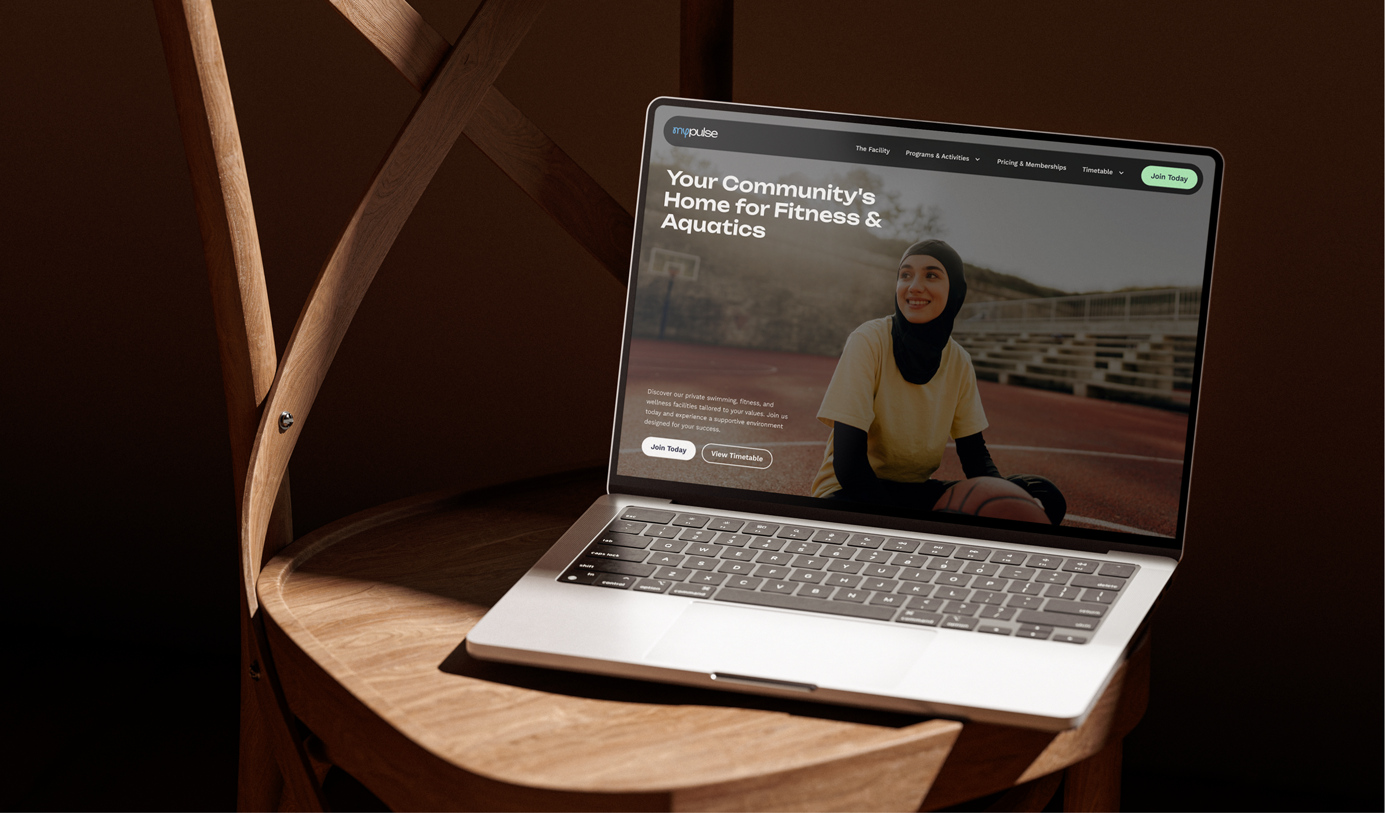 MyPulse homepage on a laptop with the hero 'Your Community's Home for Fitness & Aquatics'