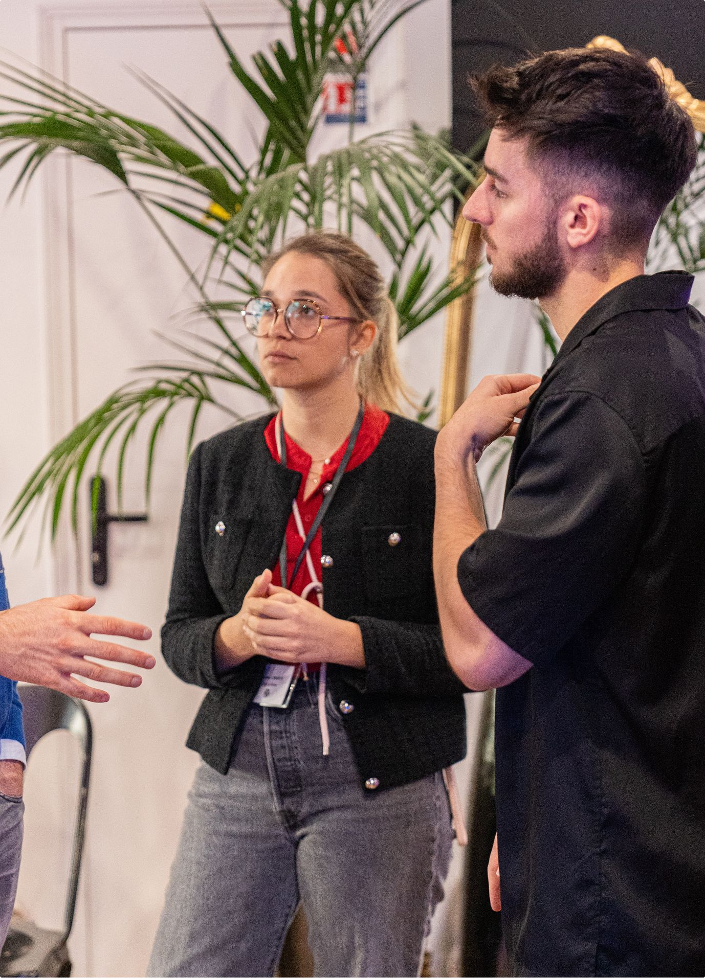 Two Sleeq team members talking at an event