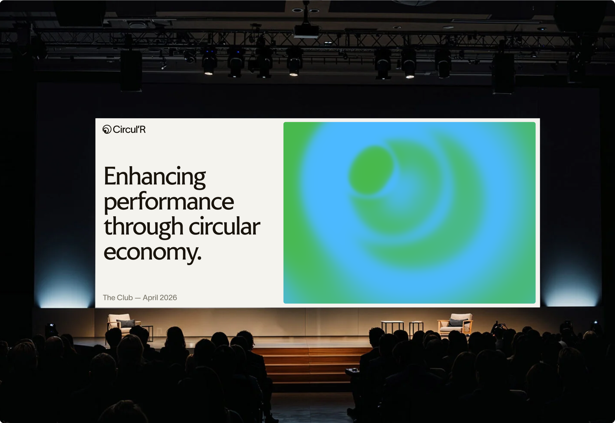 A conference stage screen showing the Circul’R slide “Enhancing performance through circular economy.”