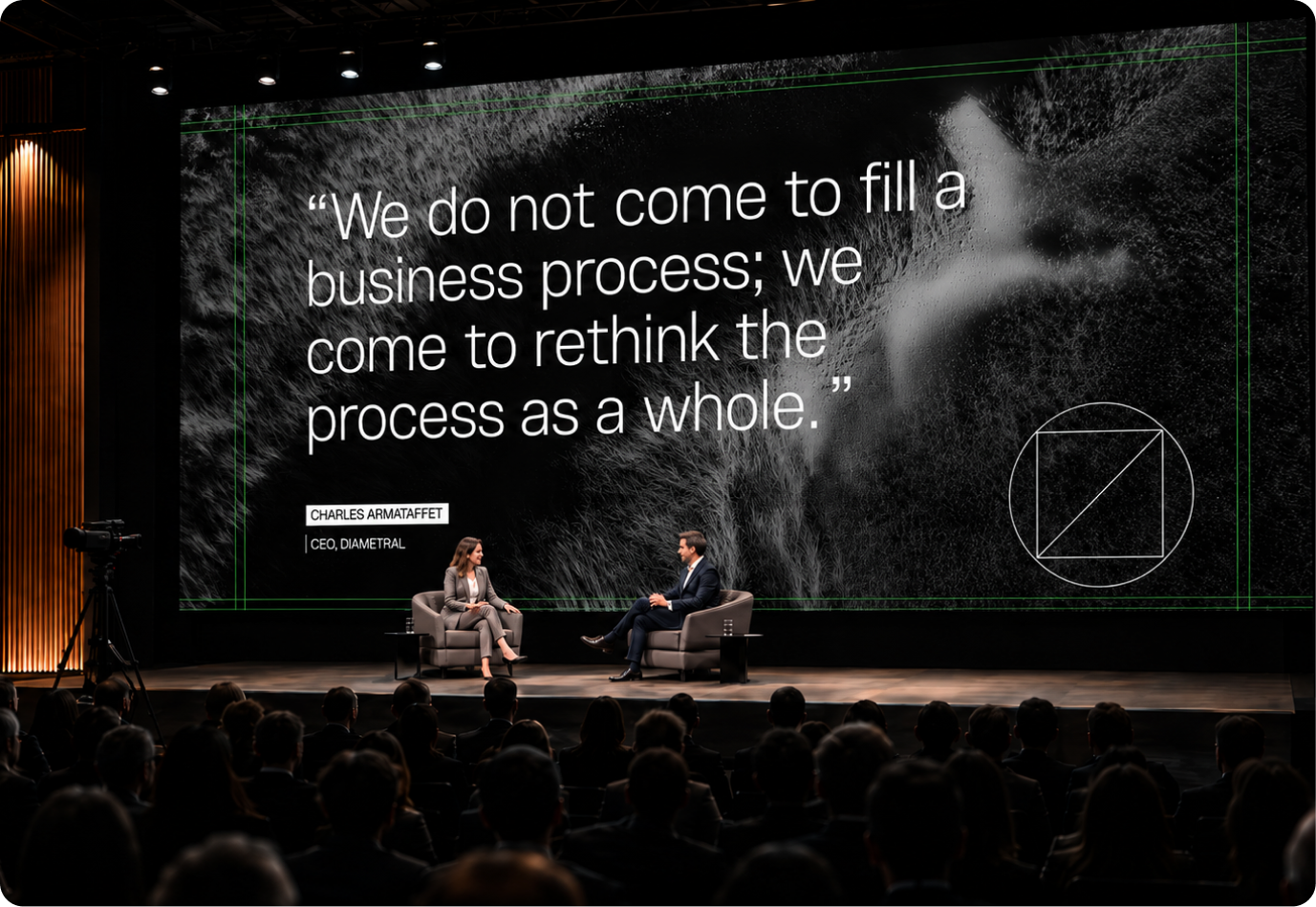 A Diametral talk on stage, in front of the quote “We do not come to fill a business process; we come to rethink the process as a whole.”