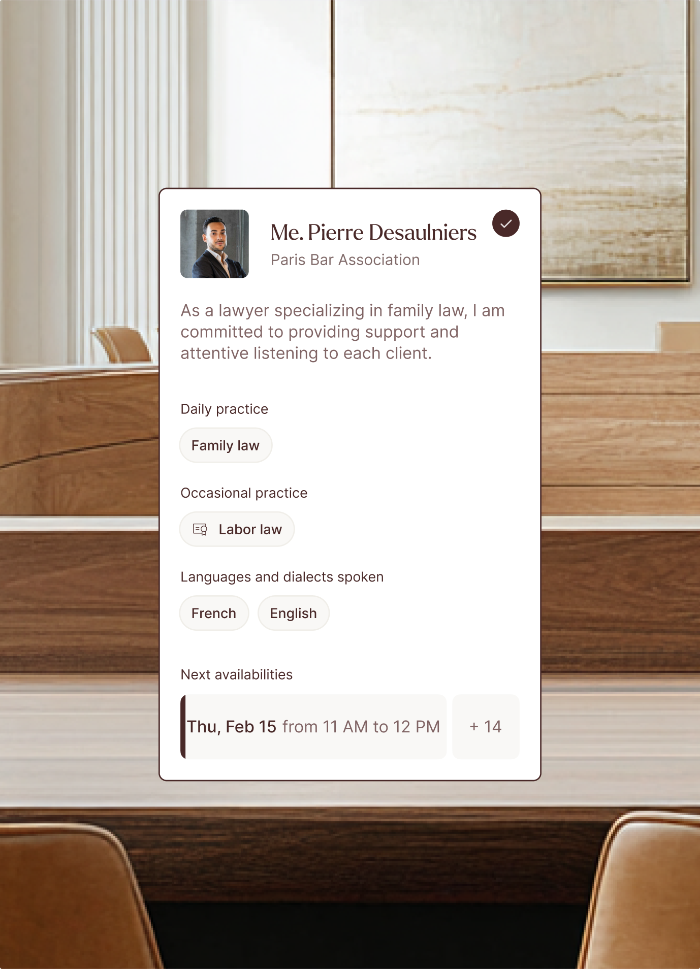 Causélis profile card of a family lawyer over a law office meeting room