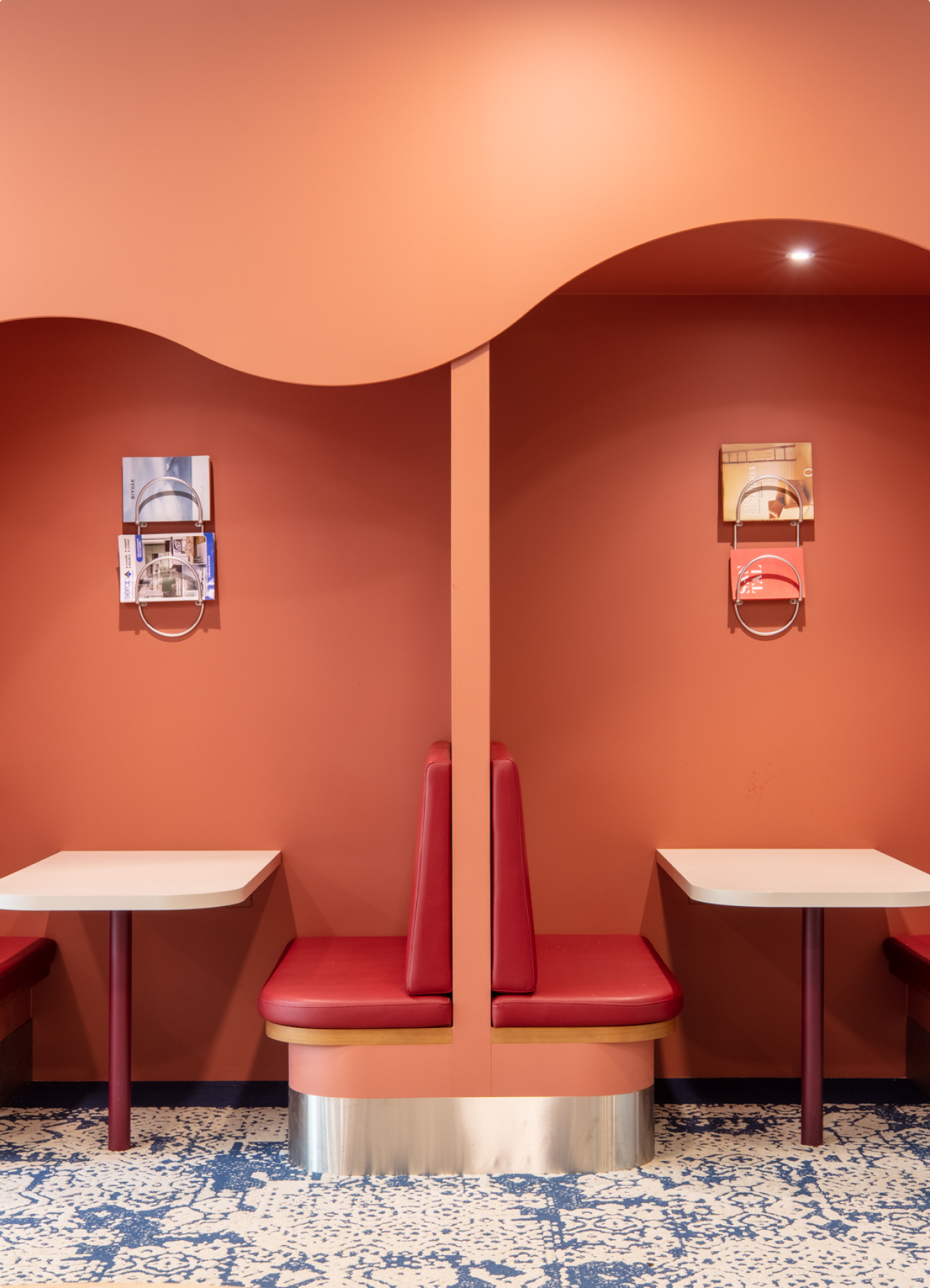 Terracotta booth seating in a workplace fitted out by BMA