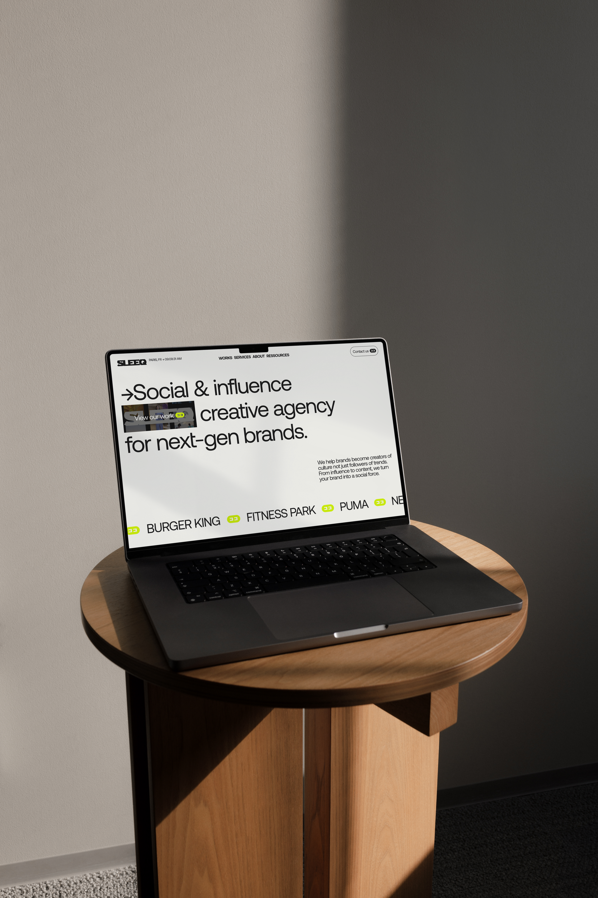 The Sleeq website on a laptop