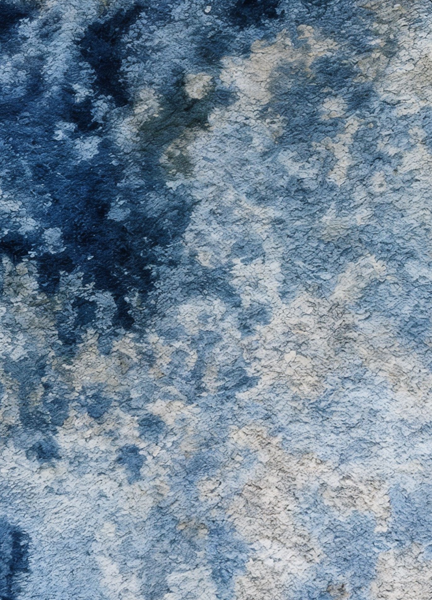 Close-up of a blue and beige carpet