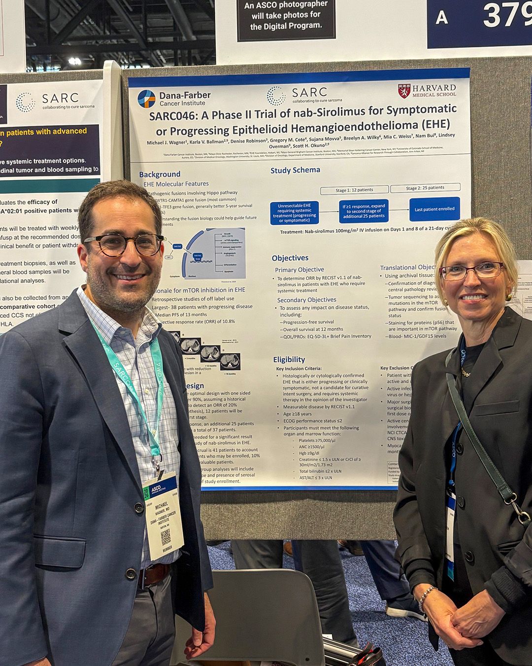 Dr. Michael Wagner and Denise Robinson standing in front of a scientific poster