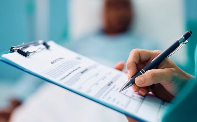 writing on a clipboard