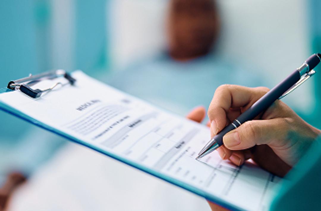 writing on a clipboard