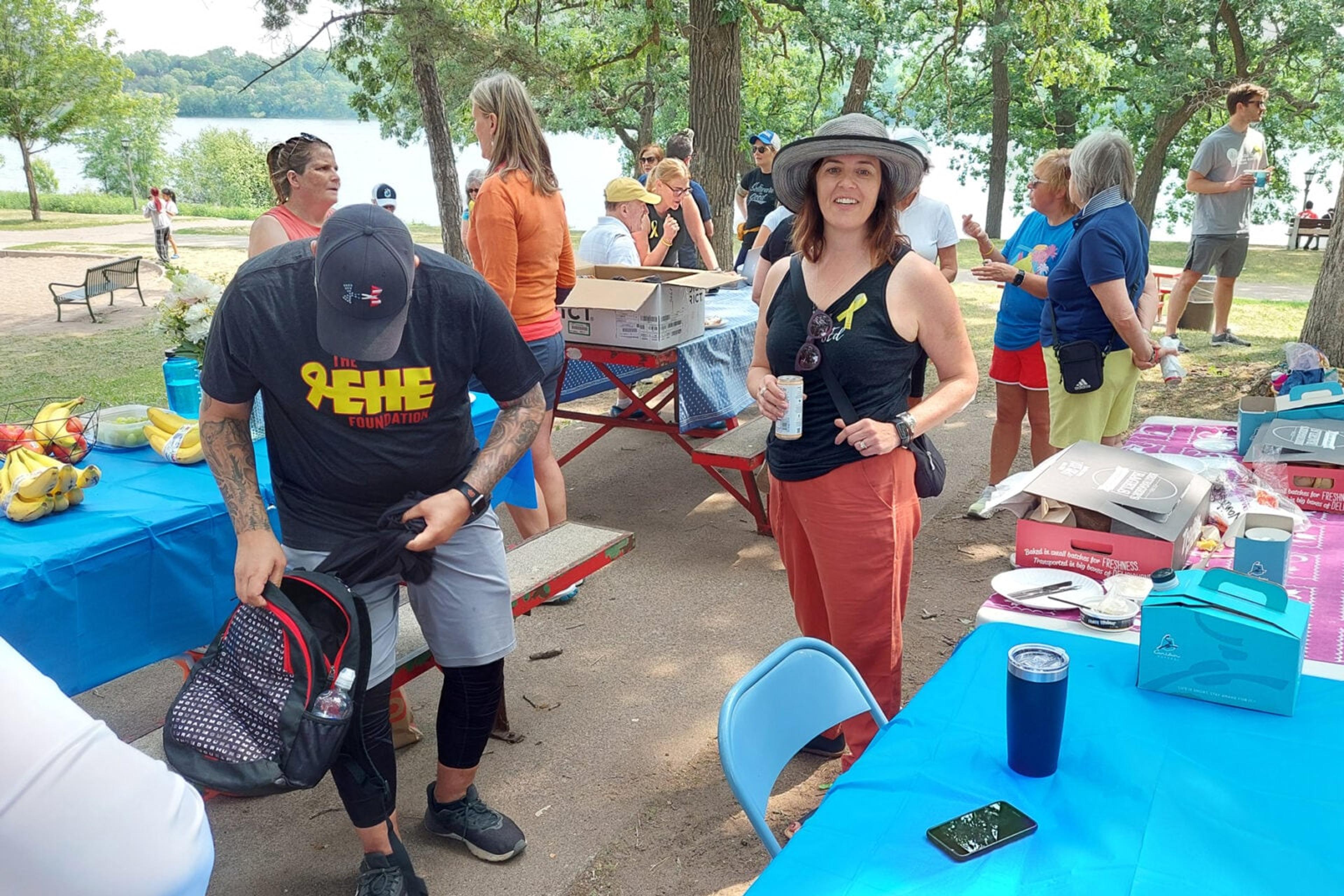 A group of people in the park having a party