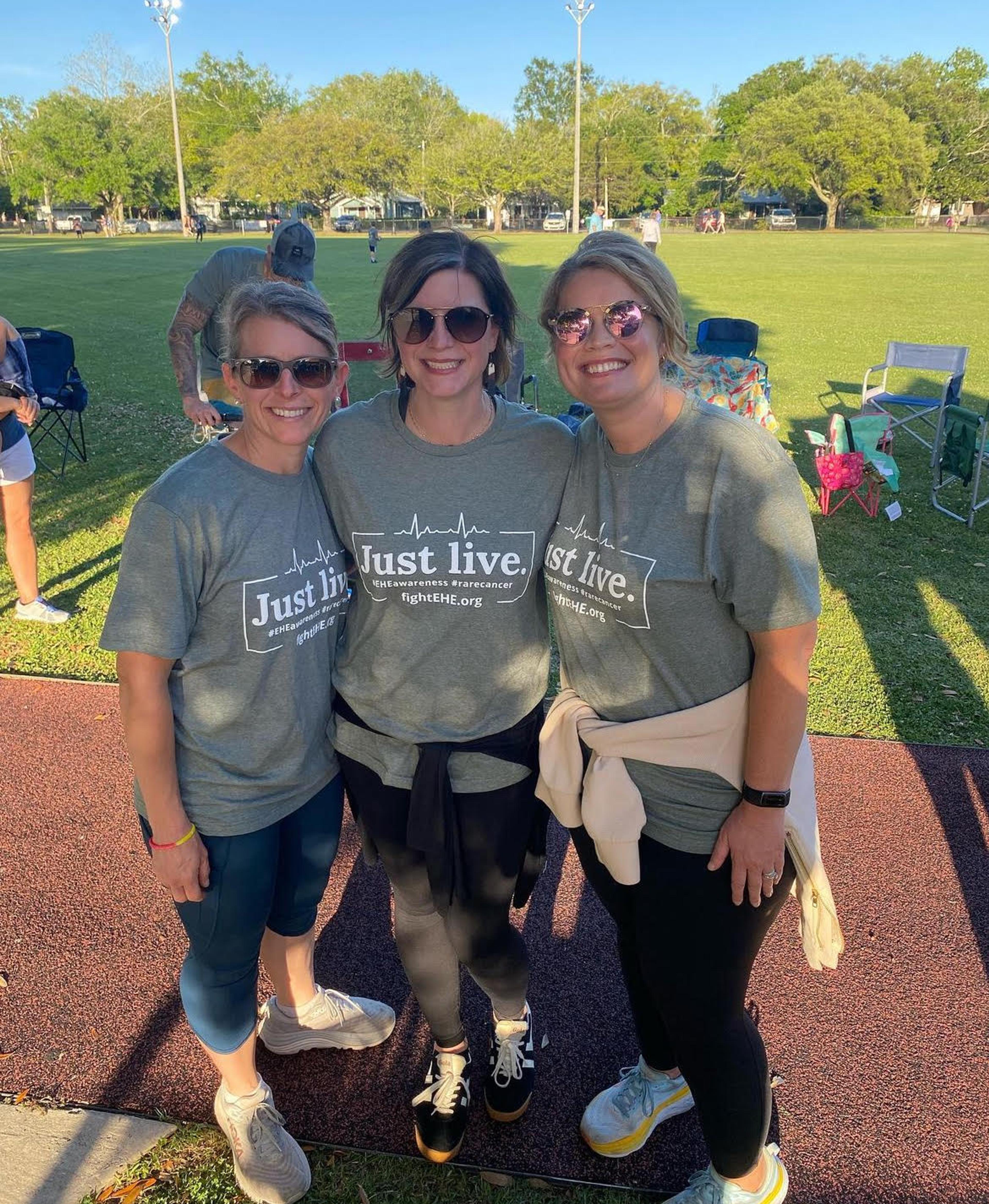 Three woman take a photo together