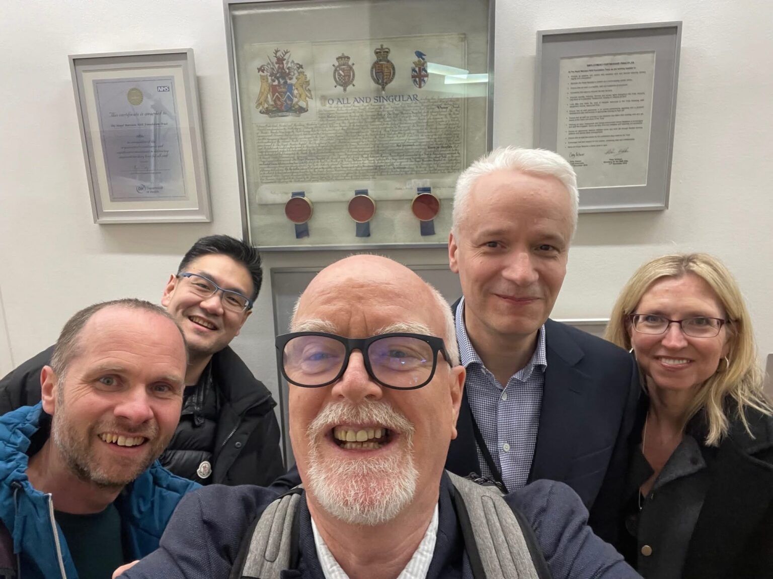The EHE team takes a selfie with friends
