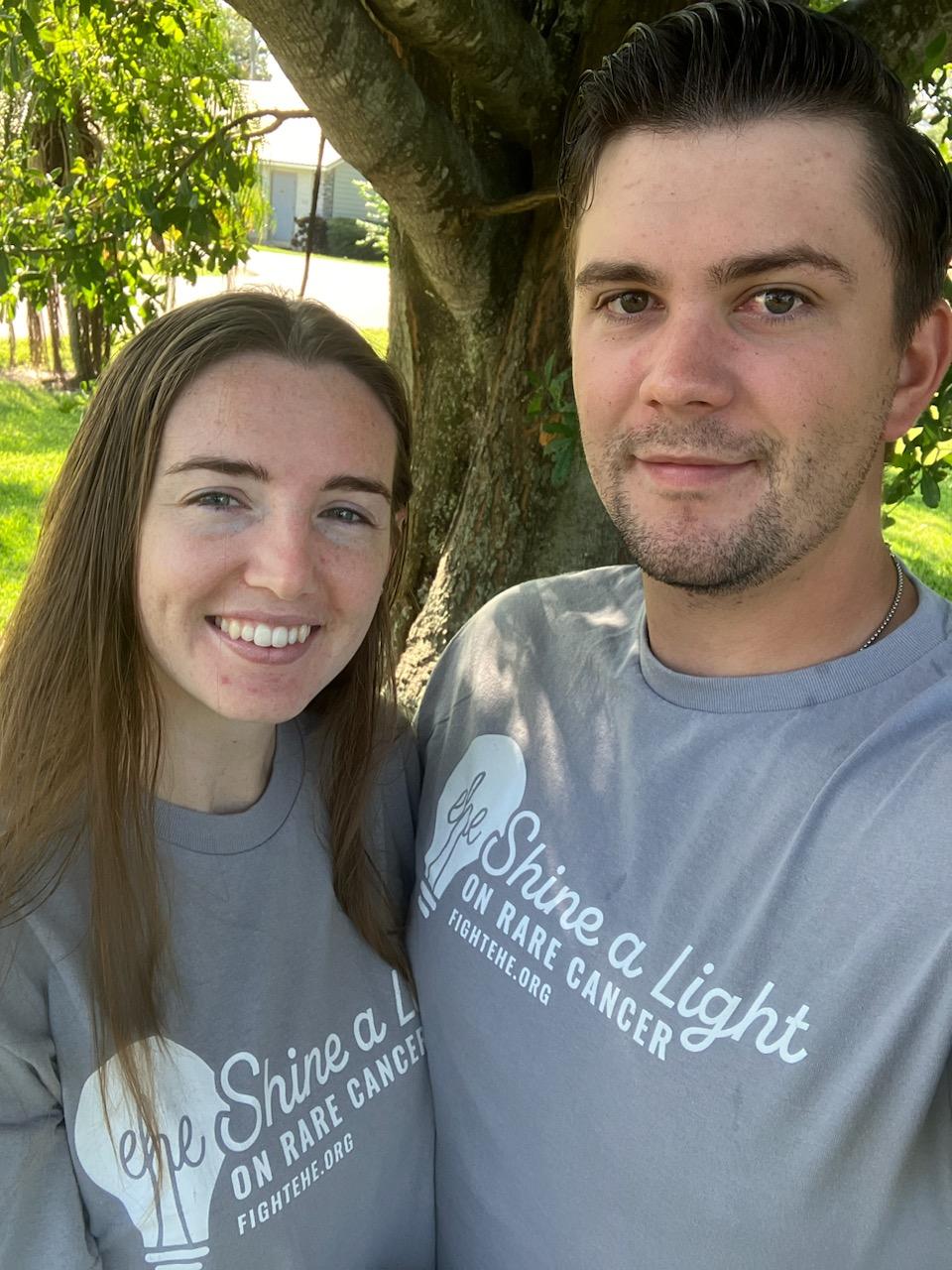 A Couple wearing matching tshirts