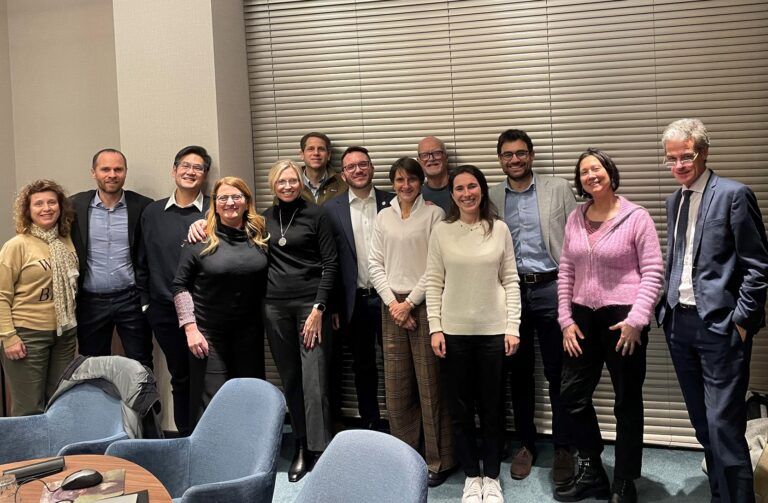 A group of EHE advocacy leaders gather for a group photo.