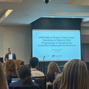 A person presenting information at ASCO