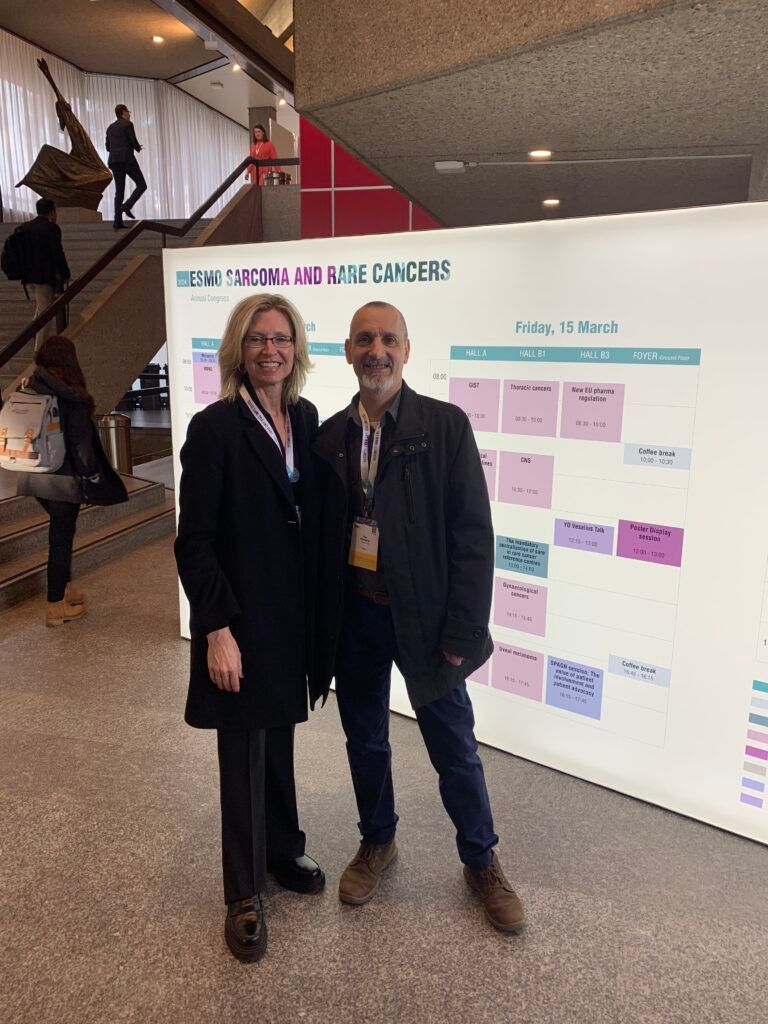 Dinise  and a colleague at ESMO