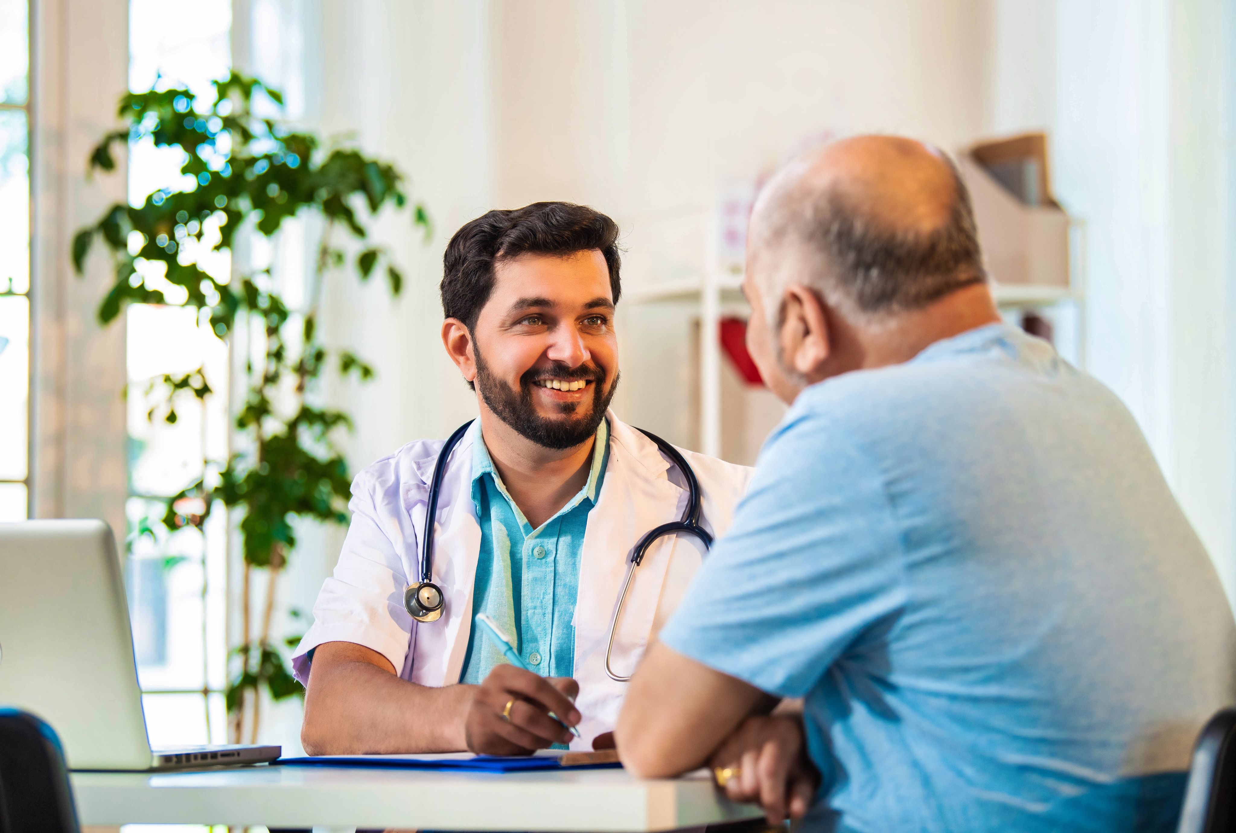 man meeting with his doctor