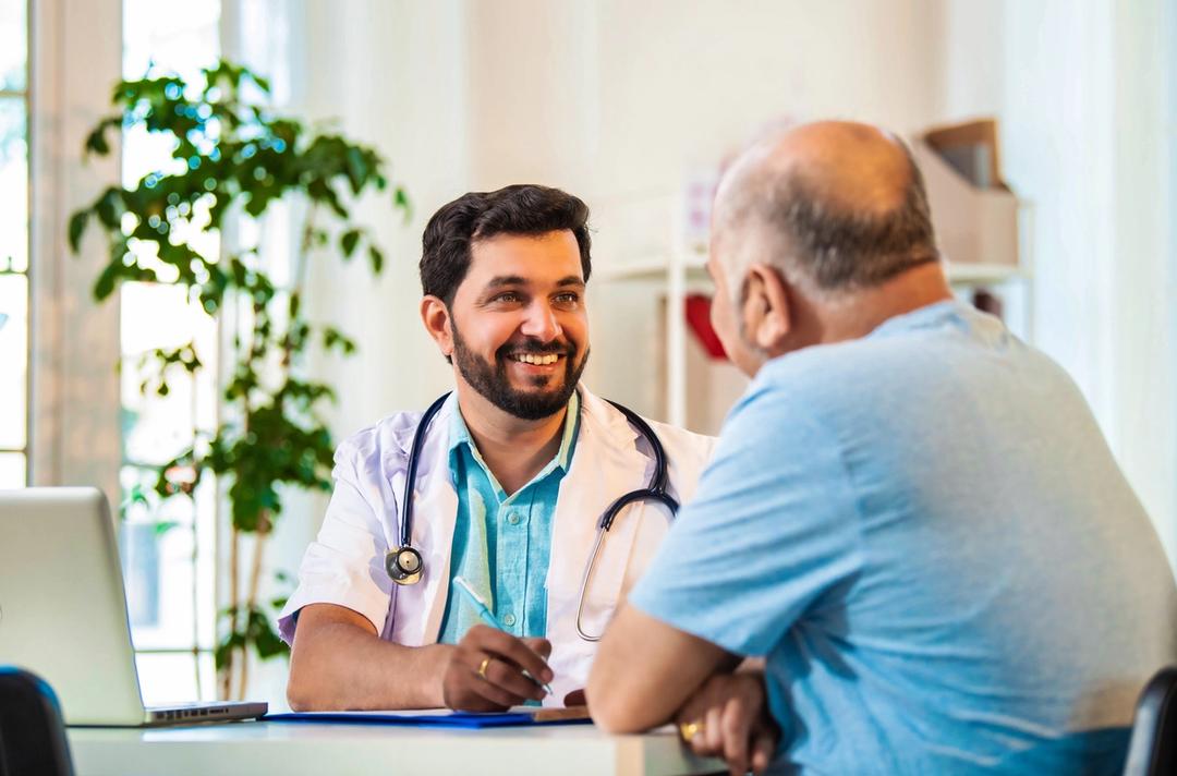man meeting with his doctor