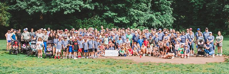 A large landscape photo featuring everyone from the walk & run event