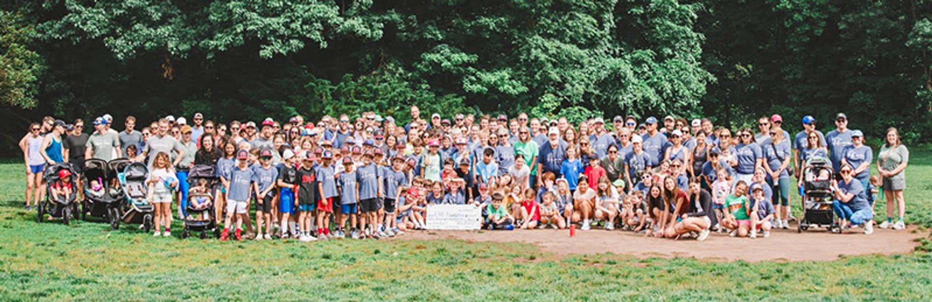 A large landscape photo featuring everyone from the walk & run event