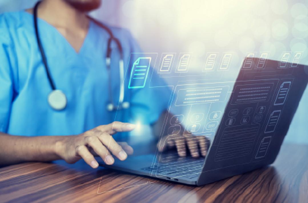 doctor on a computer