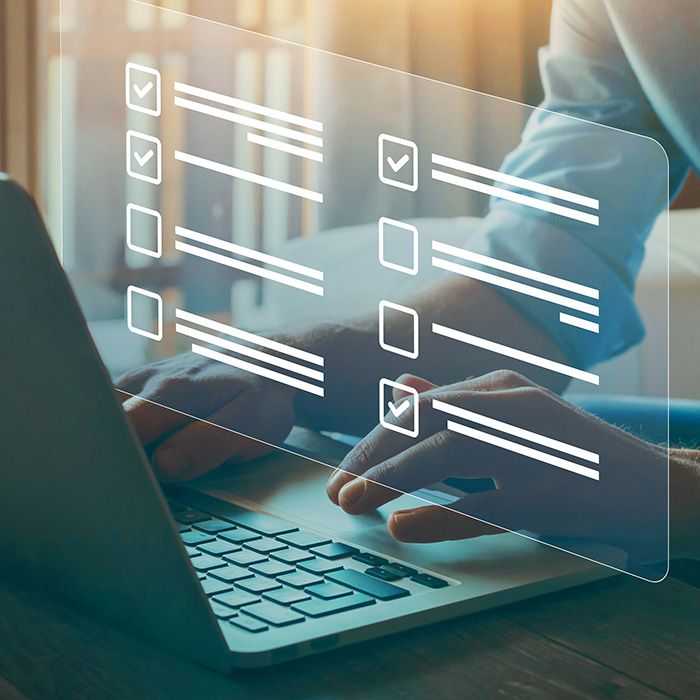 person filling out survey on the computer