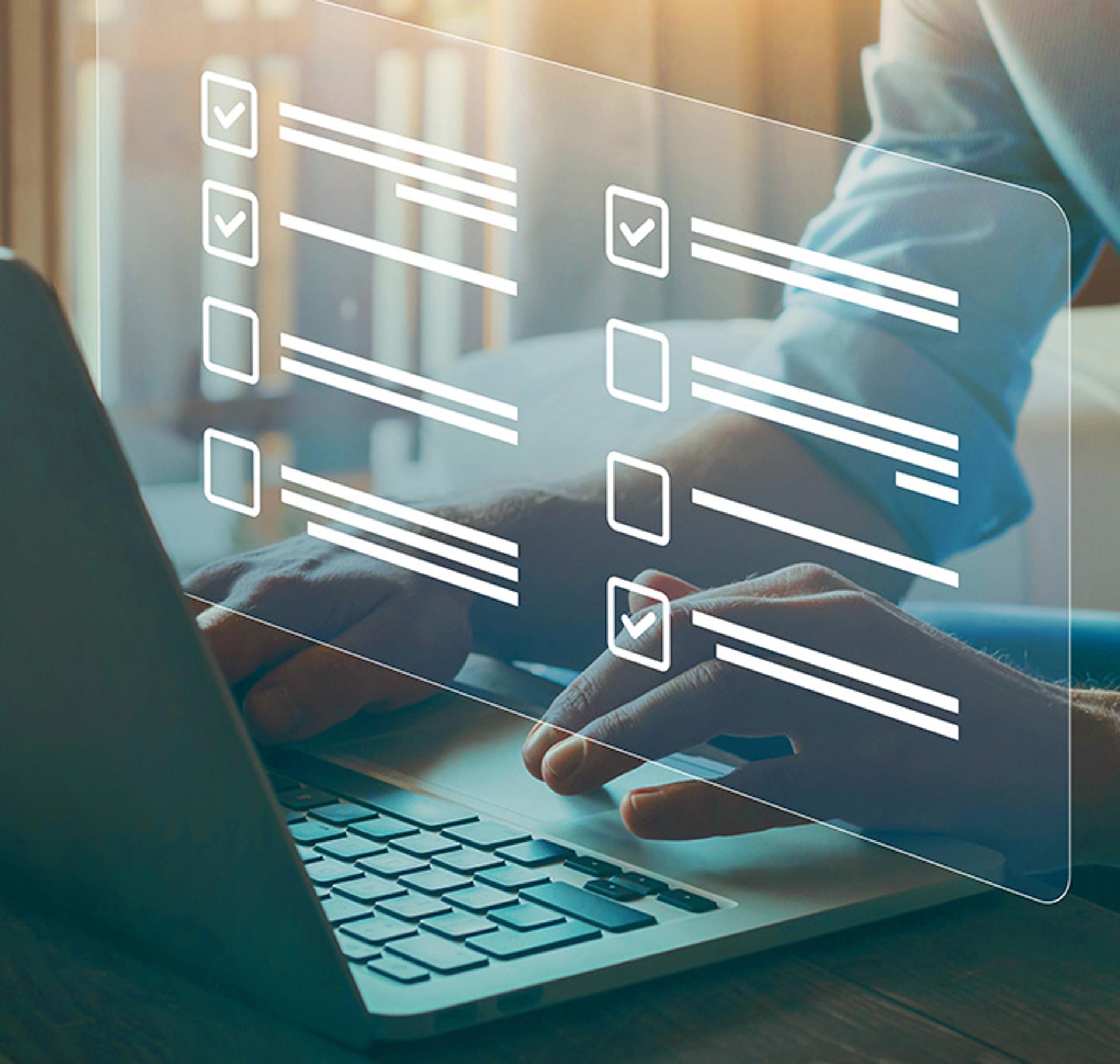 person filling out survey on the computer