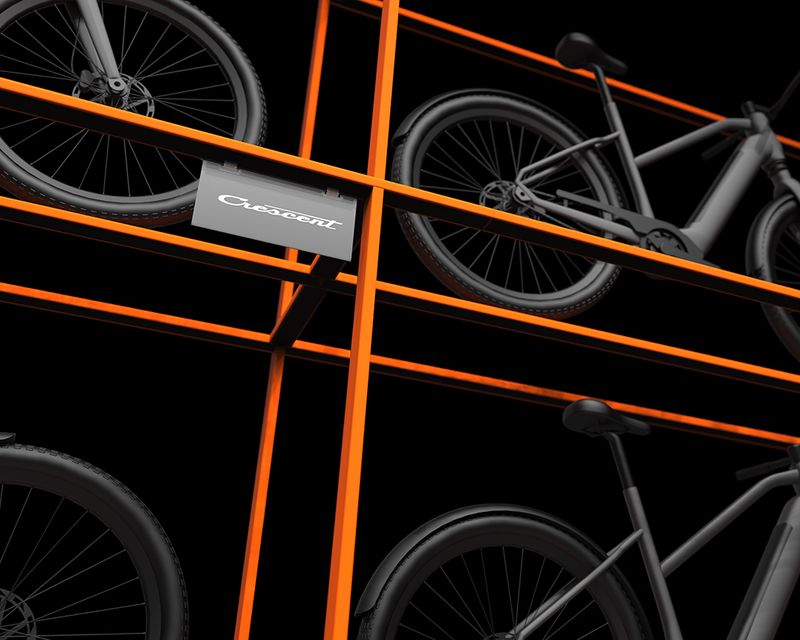 a row of bicycles are stacked on top of each other on a shelf .