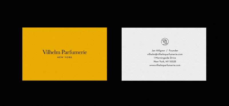 Two business cards side-by-side. The yellow card on the left reads "Vilhelm Parfumerie NEW YORK". The white card on the right lists contact information for Jan Ahlgren, Founder of Vilhelm Parfumerie.