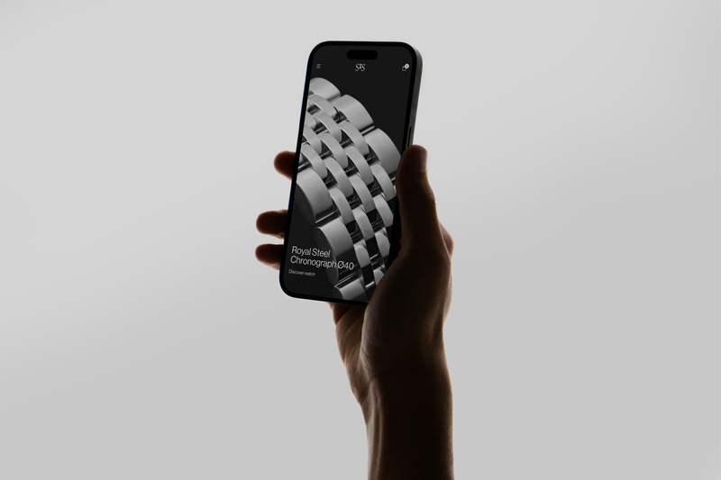a person is holding a phone that says royal steel on the screen