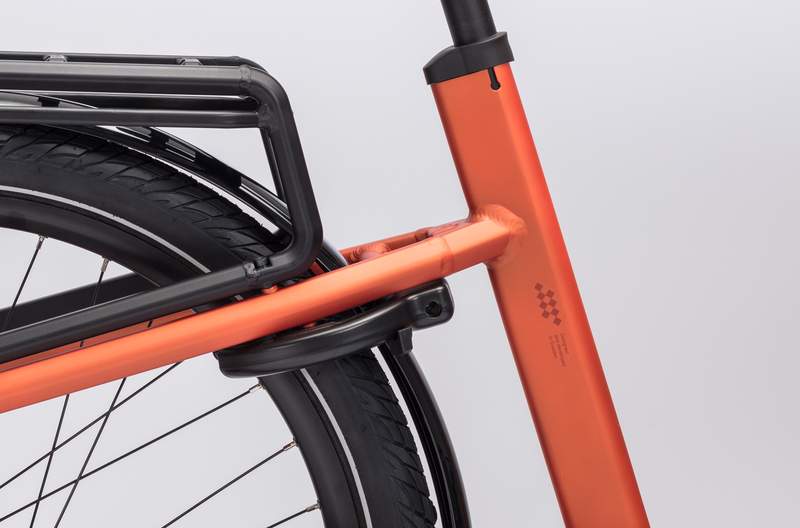 a close up of a bicycle with a rack on the back of it .