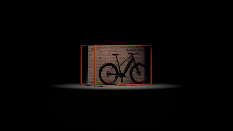 a bicycle is sitting inside of a brick box .