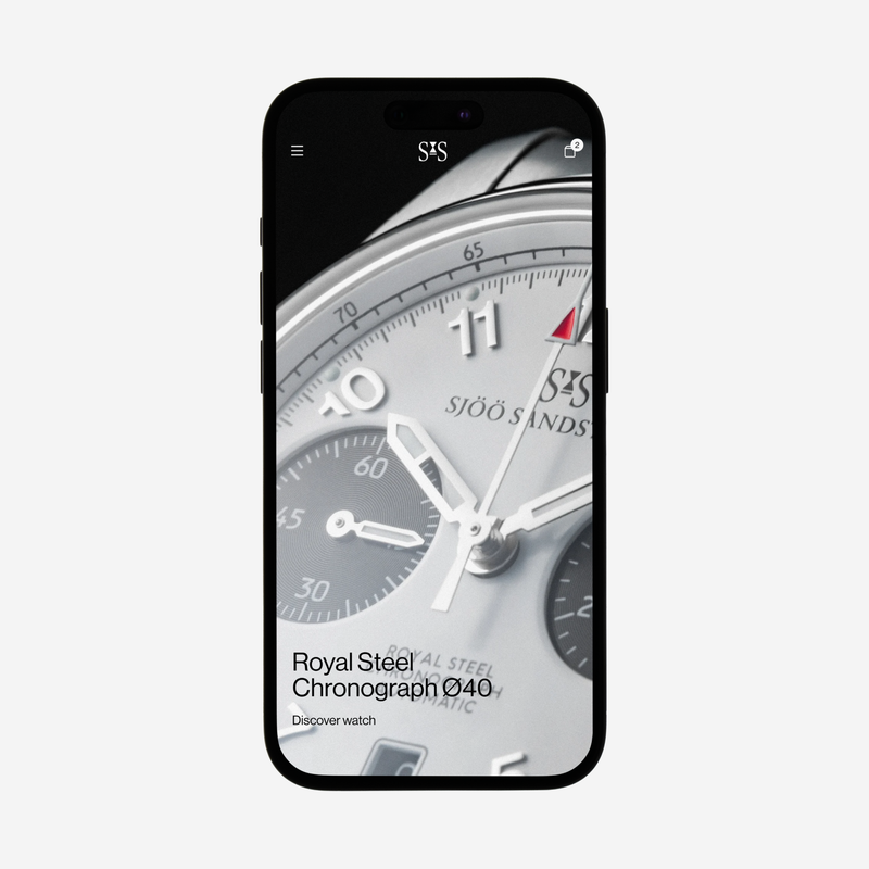 a phone screen displays a royal steel chronograph