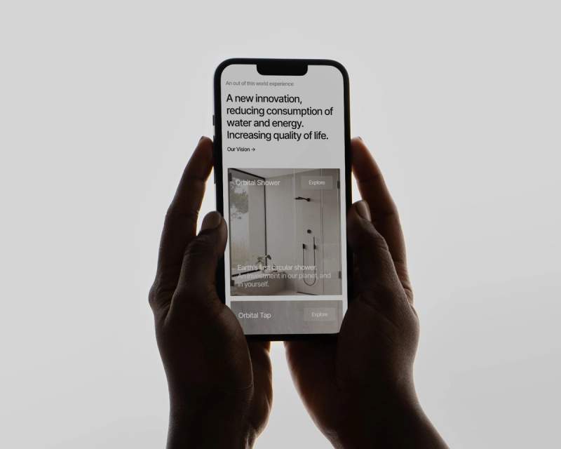 a person is holding a cell phone in their hands .