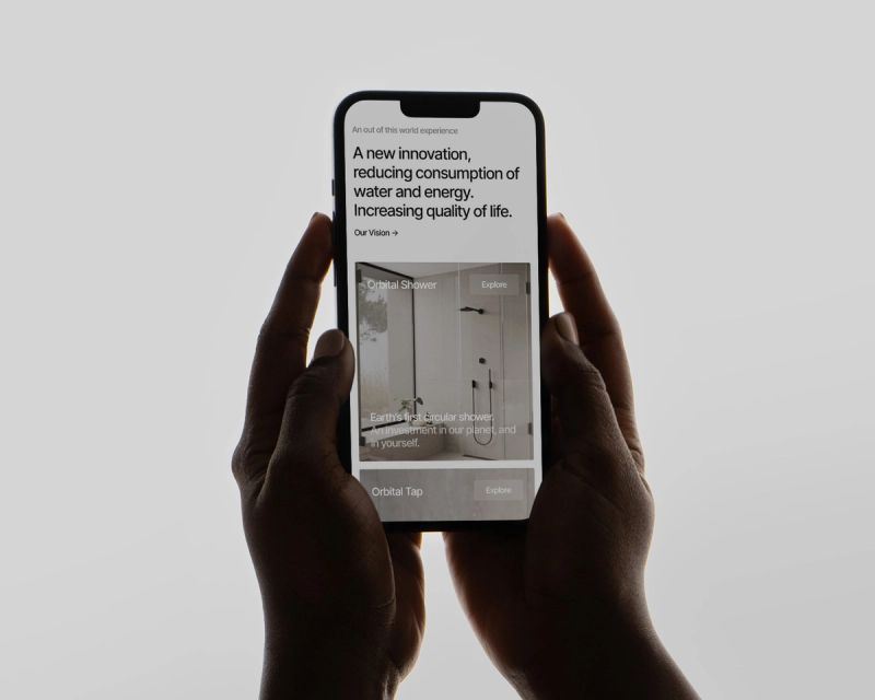 a person is holding a cell phone in their hands .