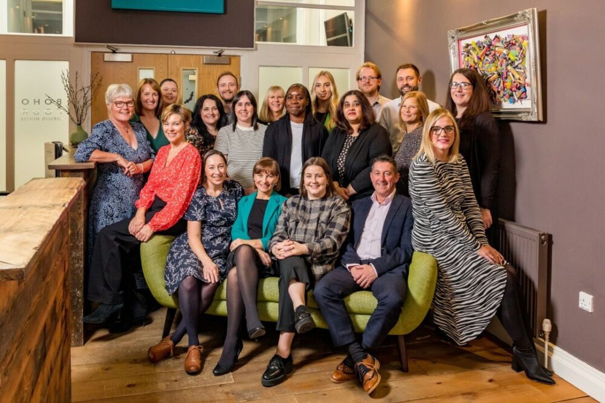 Group from Lexonik Team posing for a photograph together.