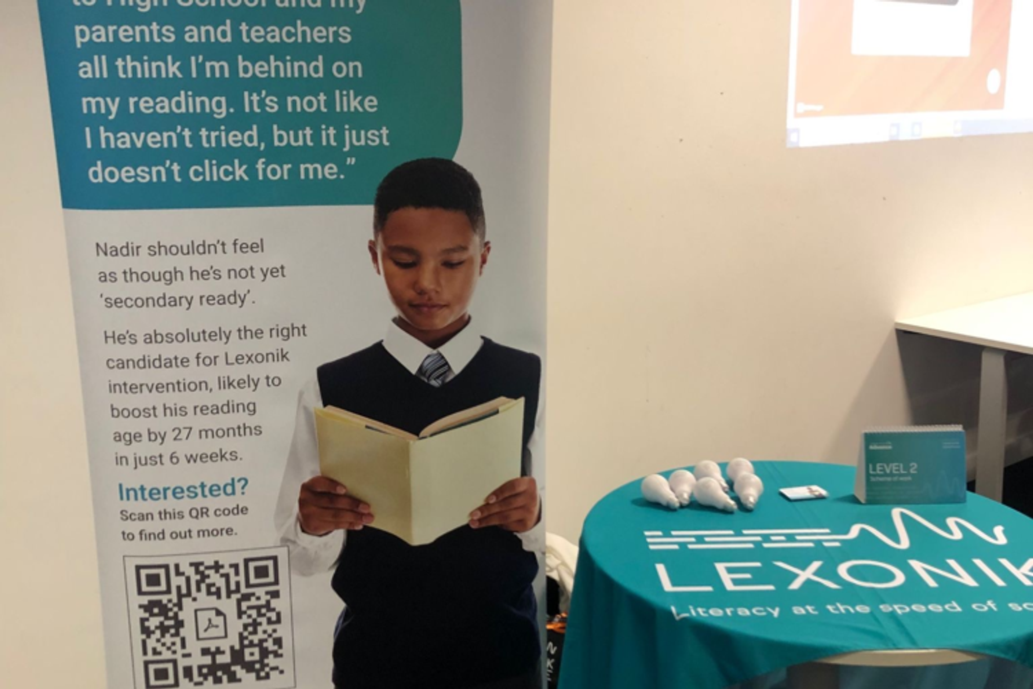 A poster and a table branded Lexonik