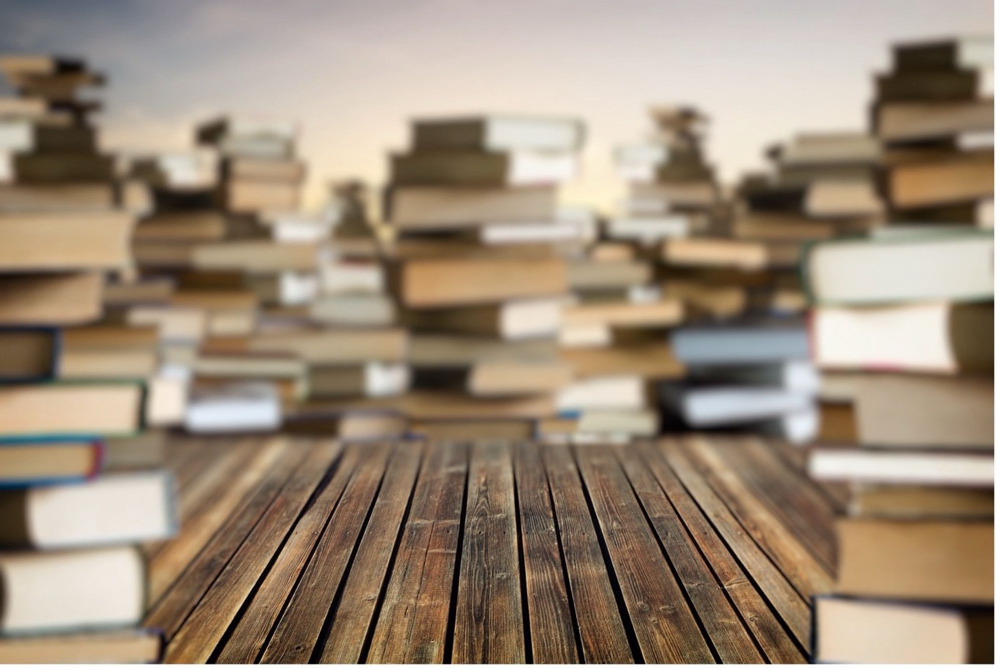 Many piles of books going far into the distance.