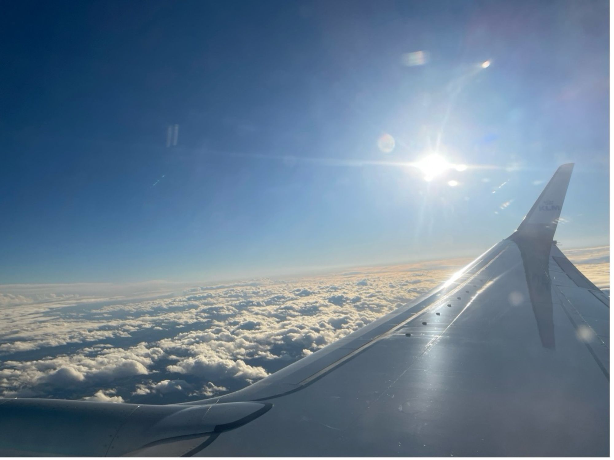 The wing of an aeroplane from a passenger window.