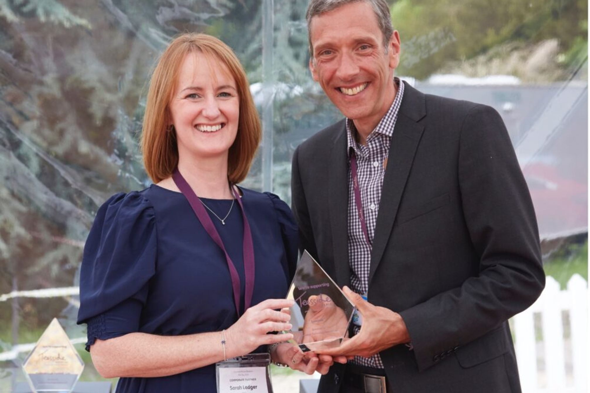 Lexonik CEO Sarah Ledger receiving an award