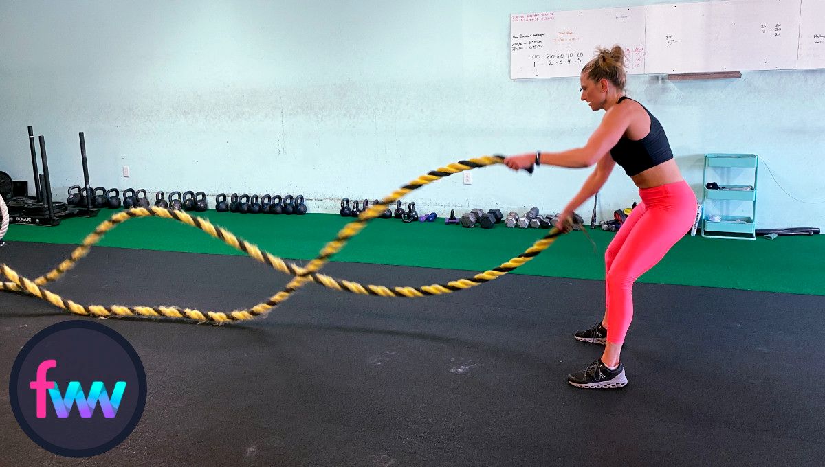Kindal pumping those battle ropes and trying to know them out as fast as possible while keeping her heart rate as much in control as possible.