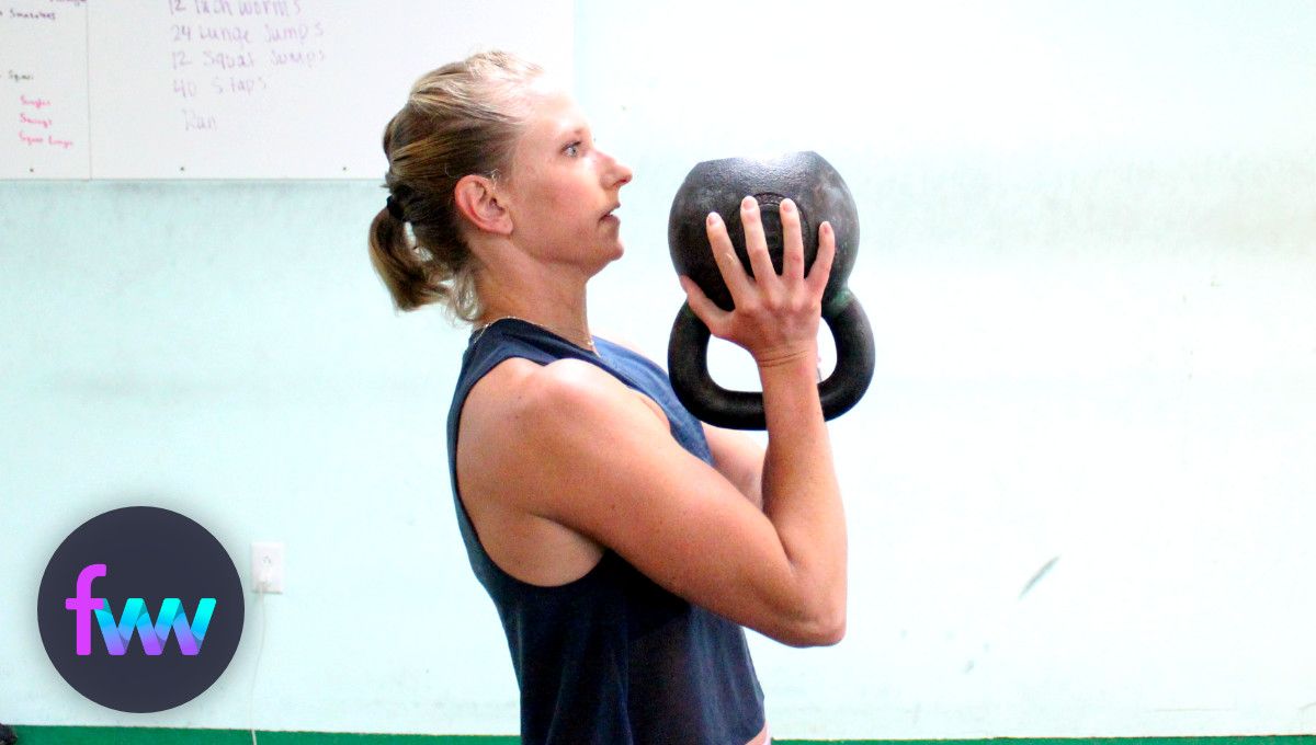 Kindal holding a kettlebell in cannonball