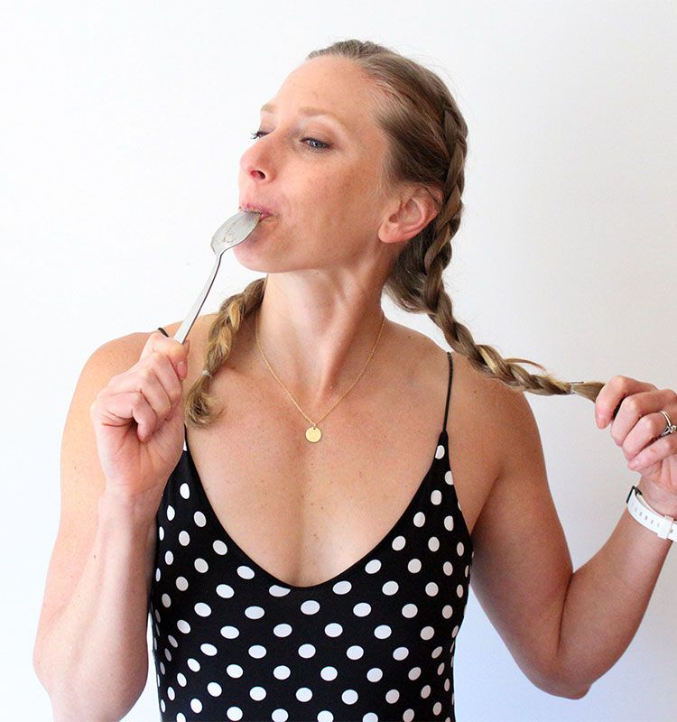 Private Nutrition Coaching Kindal licking a spoon with satisfaction