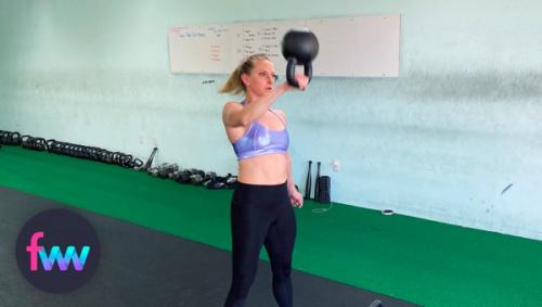 Kindal in the transition part of the kettlebell snatch.