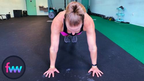 Kindal showing the hand position of the normal pushup.