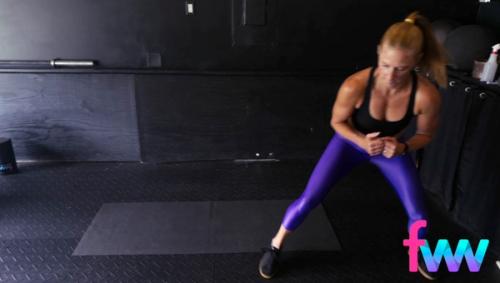 Kindal is staying low and side shuffling across the top of her yoga mat with some speed.