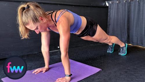 Kindal in the top of the pushup plank to set up the concentration pushup.