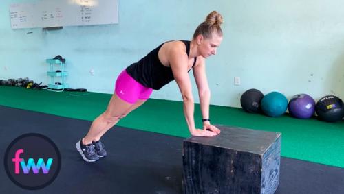 Kindal showing the top of a diamond pushup from a lower box.