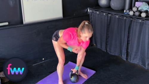 Kindal at the bottom of the floor clean in a balanced hip hinge position ready to push hard from her legs.