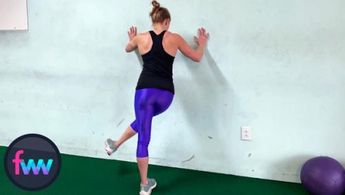 Kindal kicking inward during lateral kicks during her warm up.