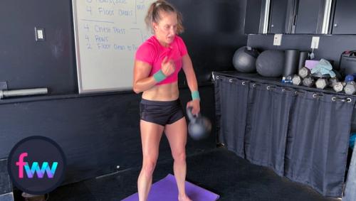 KIndal first exploding from her legs and keeping her shoulder packed so the kettlebell does not pull her arm down.