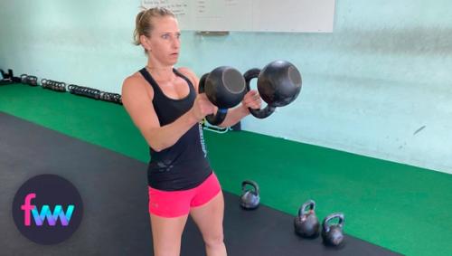 Kindal showing the top of a mismatched kettlebell swing.